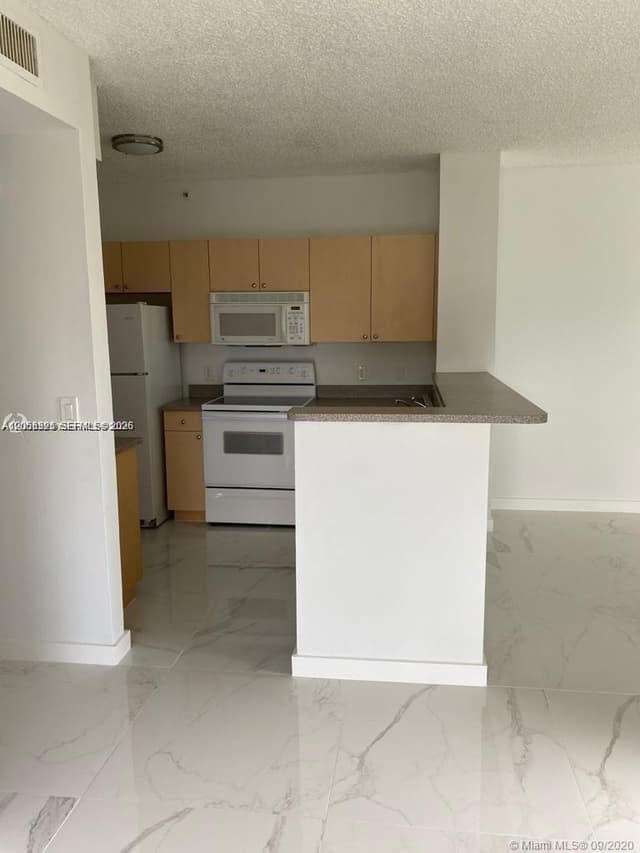 7980 N Nob Hill Rd # 102, Tamarac FL 33321 - Tamarac, FL - Photo 2